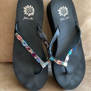 Black flip flops